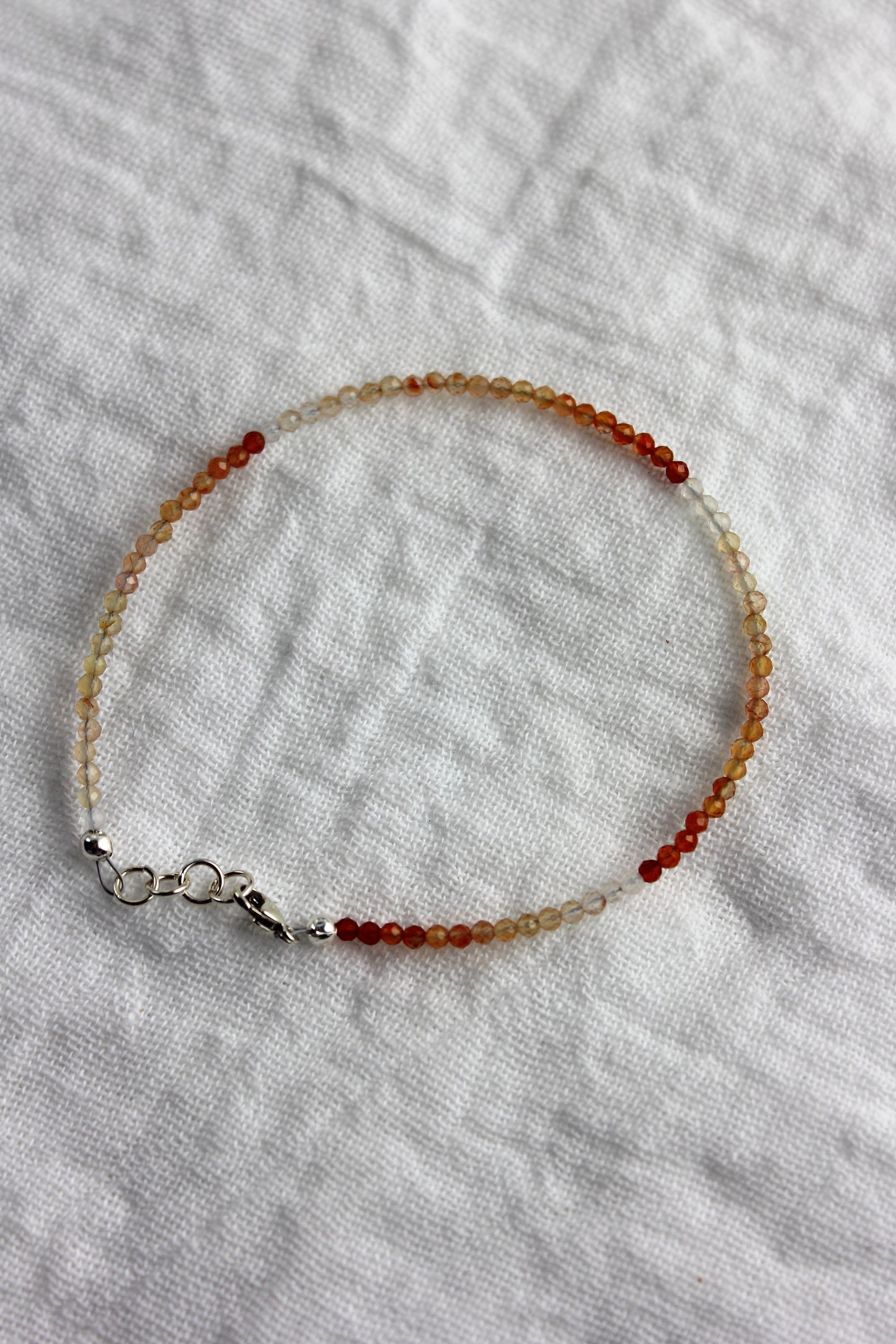 Carnelian shaded faceted micro beaded bracelet