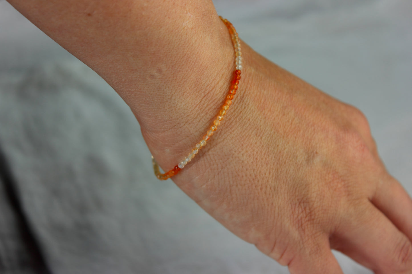 Carnelian shaded faceted micro beaded bracelet